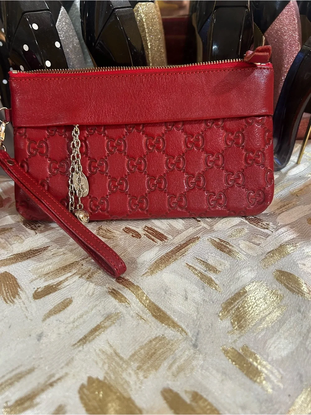 Vintage GG Red Embossed GG Leather Wristlet with Silver Chain Charm